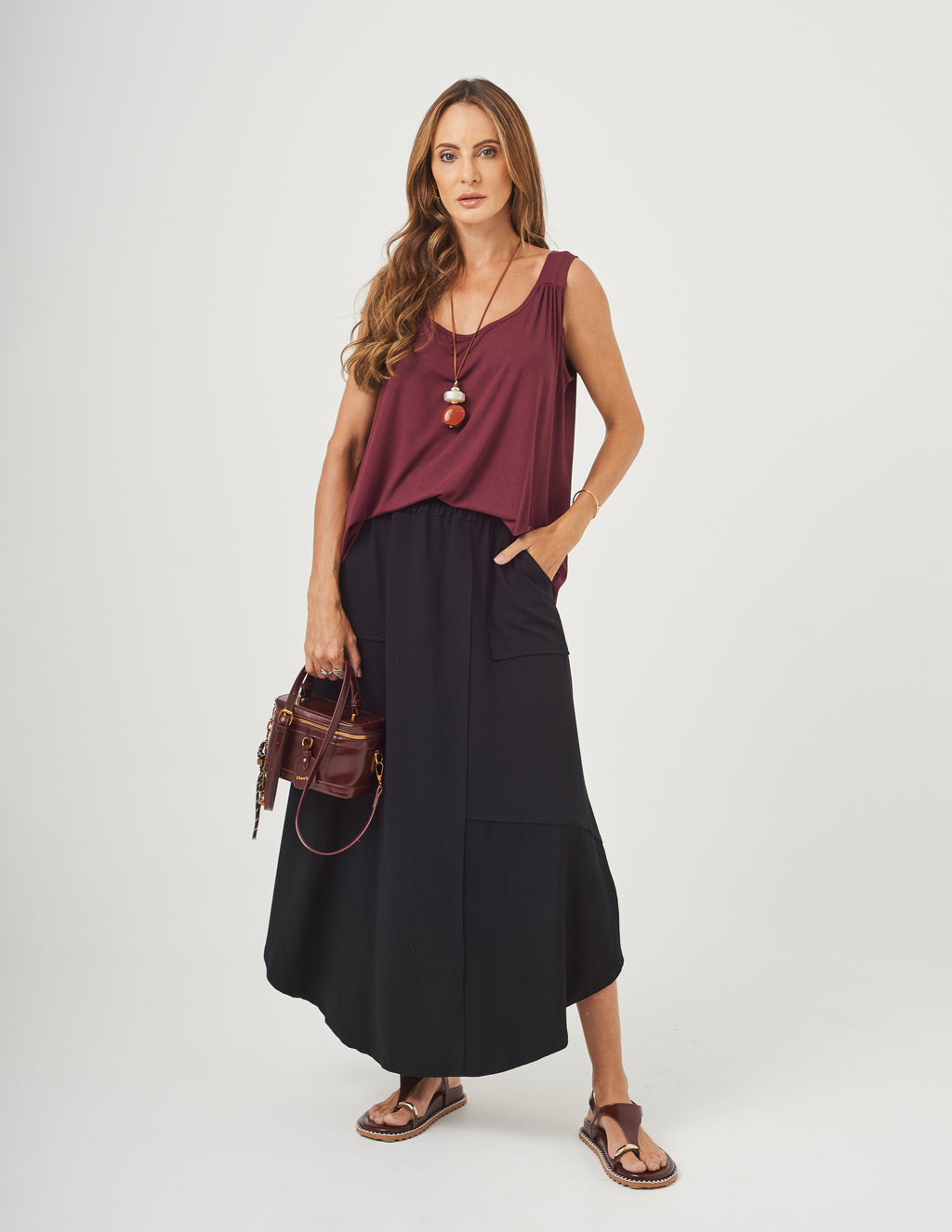 Conjunto Blusa Atenas Malbec e Saia Emma Preta